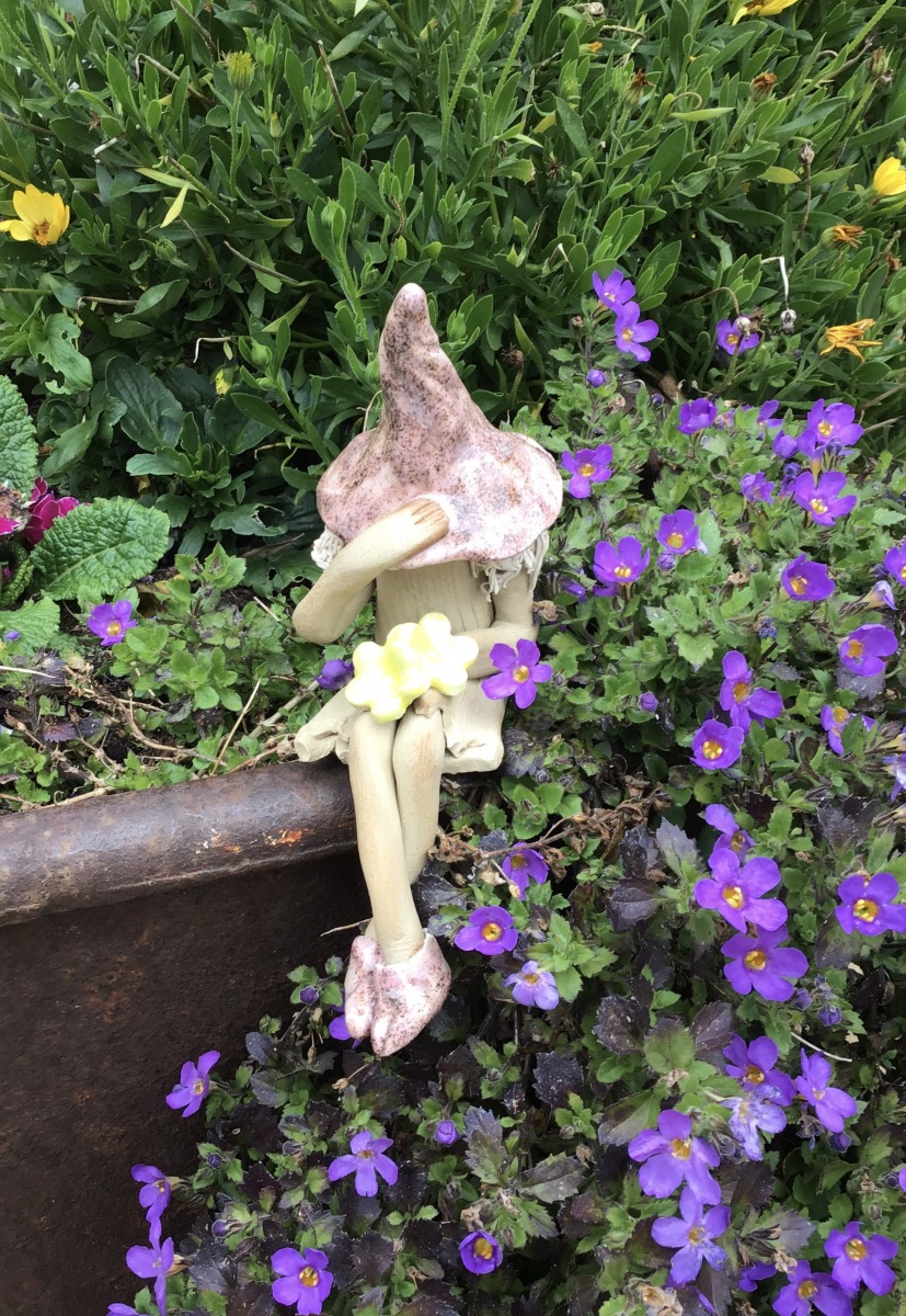 Over the edge with a posy of flowers